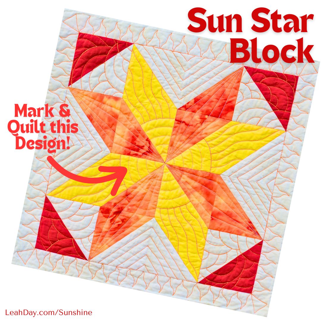 Quilt with Sun Star Block design featuring red, yellow, and orange colors on a white background.