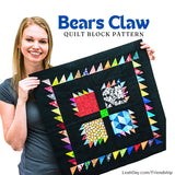 Leah Day holding a colorful Bears Claw quilt block from the Friendship Sampler Quilt Along
