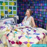 Grace 19SD with Leah Day and king sized quilt on the table