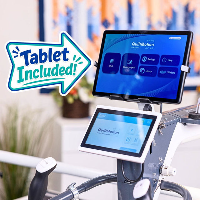 A QuiltMotion X tablet mounted on a Grace longarm quilting machine. A large teal and white 'Tablet Included!' graphic overlay appears on the left.