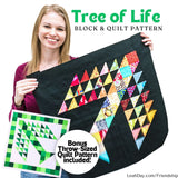 Leah Day holding a Tree of Life quilt block with colorful triangles and text about the pattern.