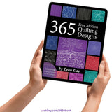 365 Free Motion Quilting Designs quilting ebook on a computer tablet