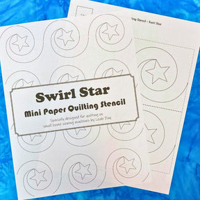 Swirl Star mini paper quilting stencil on a blue background